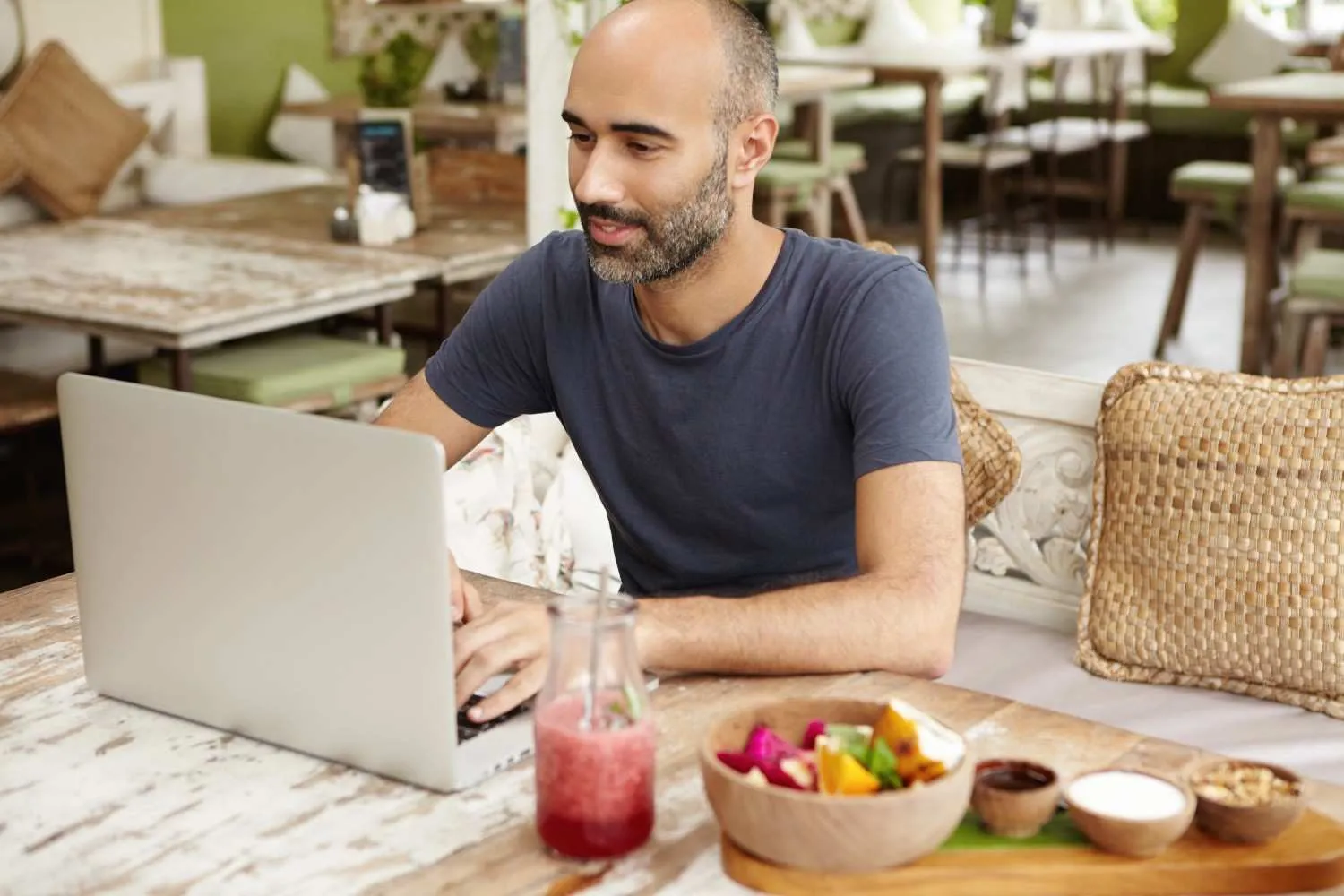 A reader catching up on the day's GoWealthDaily tips